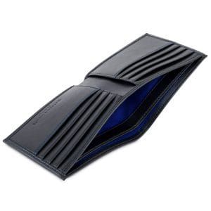 Open bifold wallet in black with cobalt blue lining, showcasing multiple card slots and compartments. Crafted from vegan corn leather with RFID protection